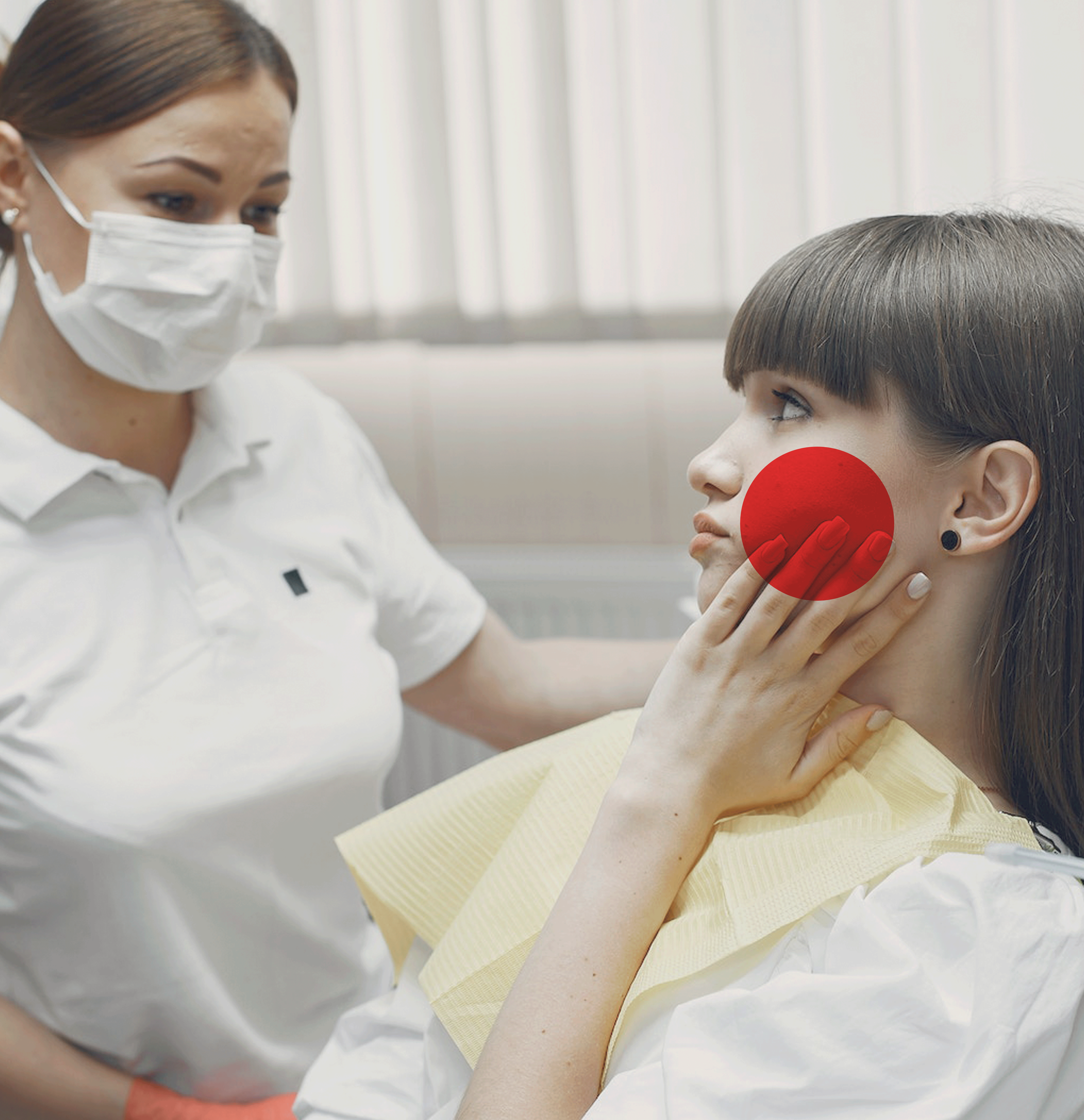 A photograph of a woman experiencing dental pain during a dental appointment.