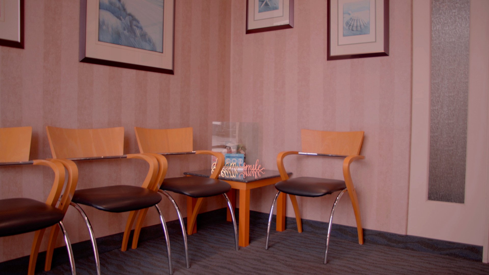 A photograph showcasing the elegant waiting room at Serena Family & Cosmetic Dentistry, designed for comfort and relaxation.