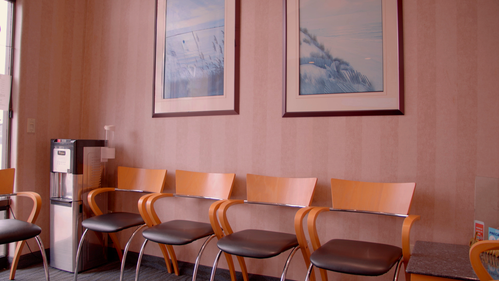 A photograph showcasing the elegant waiting room at Serena Family & Cosmetic Dentistry, designed for comfort and relaxation.